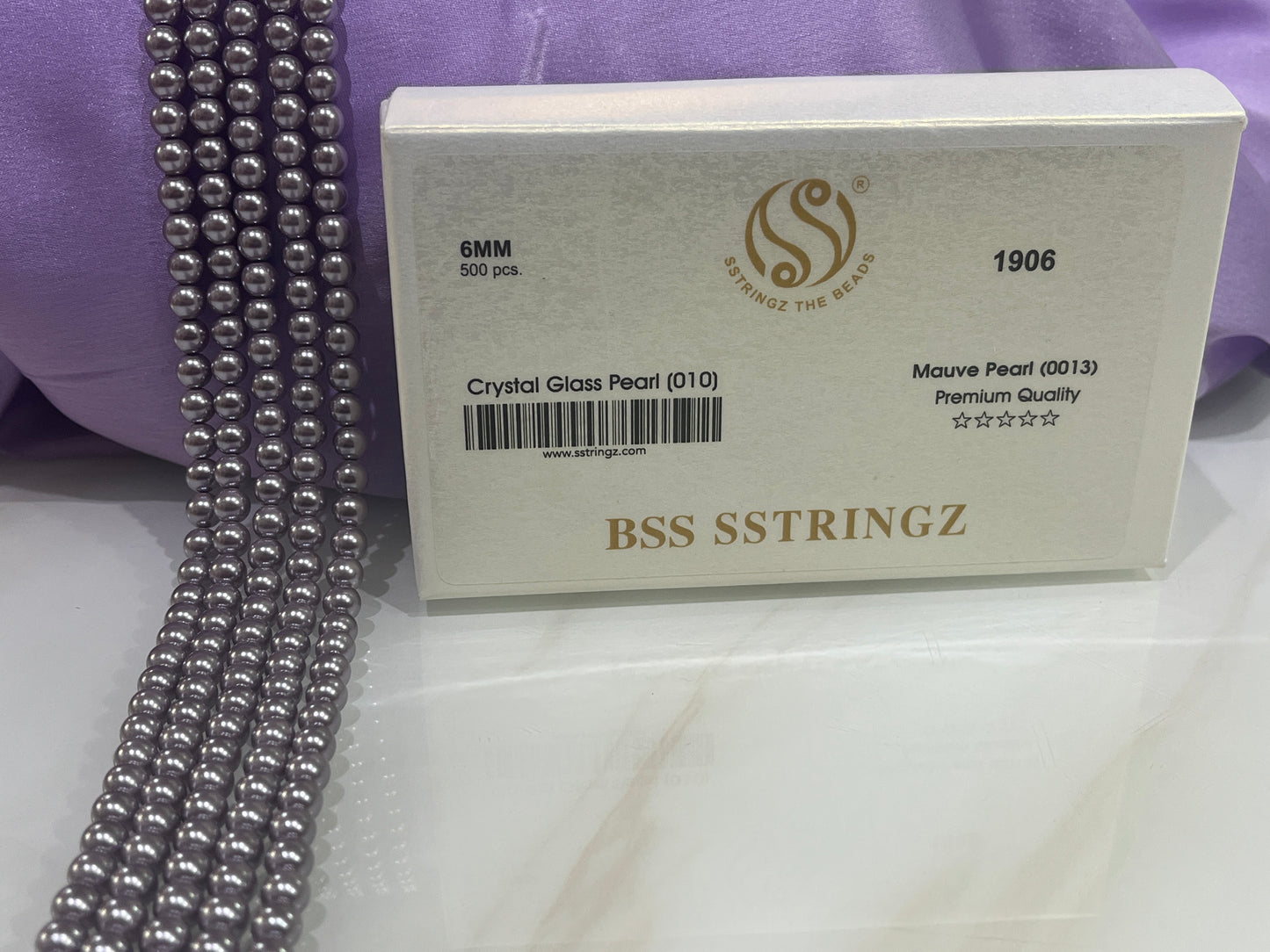 BSS SSTRINGZ MAUVE PEARL 6MM