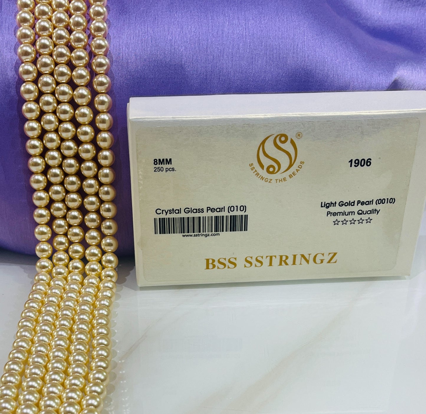 BSS SSTRINGZ LIGHT GOLD PEARL 8MM