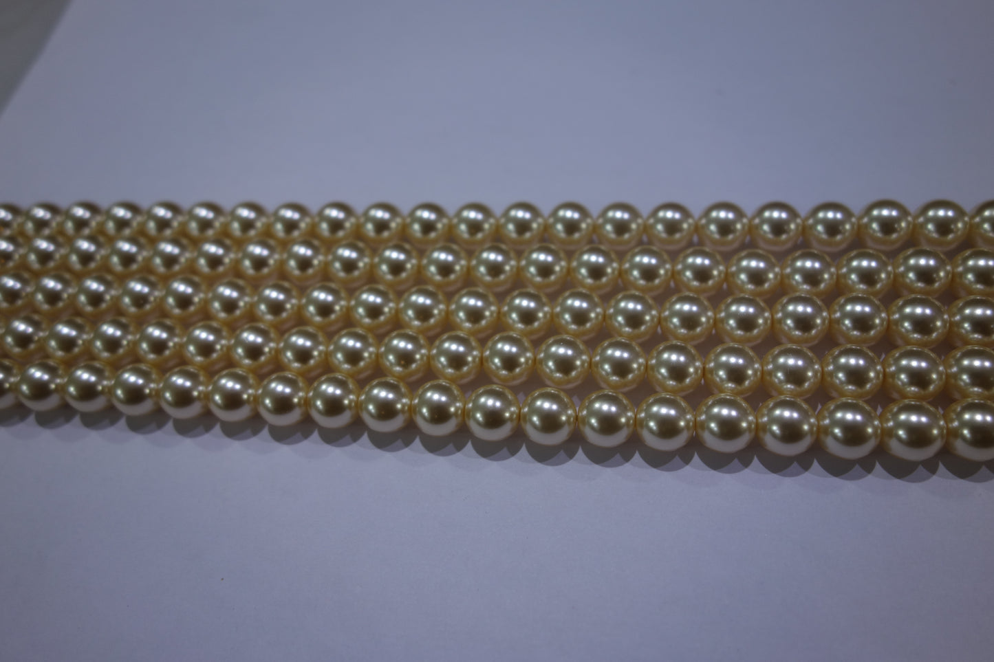 BSS SSTRINGZ LIGHT GOLD PEARL 8MM